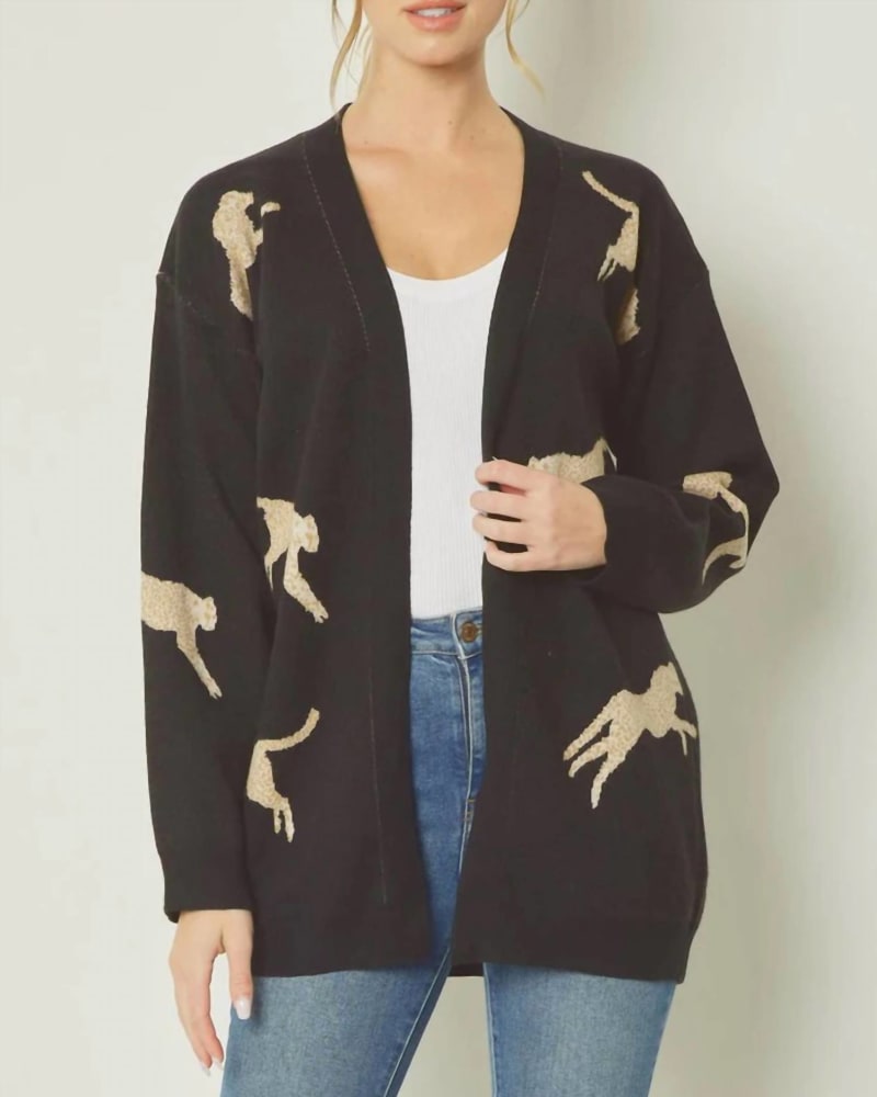 Front of a model wearing a size L Cheetah Cardigan in Black in Black by entro. | dia_product_style_image_id:325971